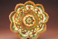 唐三彩在唐朝兴起的原因是什么